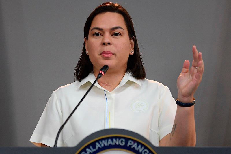 (FILES) Philippine Vice President Sara Duterte speaks during a press conference at her office in Manila on December 11, 2024. Philippine lawmakers on February 5 voted to send articles of impeachment against Vice President Sara Duterte to the Senate, a day before the current congressional session was set to end. - TED ALJIBE / AFP