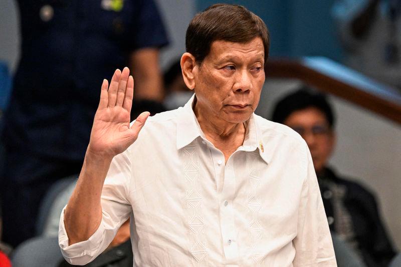 FILEpix-Former Philippine president Rodrigo Duterte takes an oath as he attends a senate probe on the drug war during his administration, in Manila on Oct 28, 2024. AFPpix