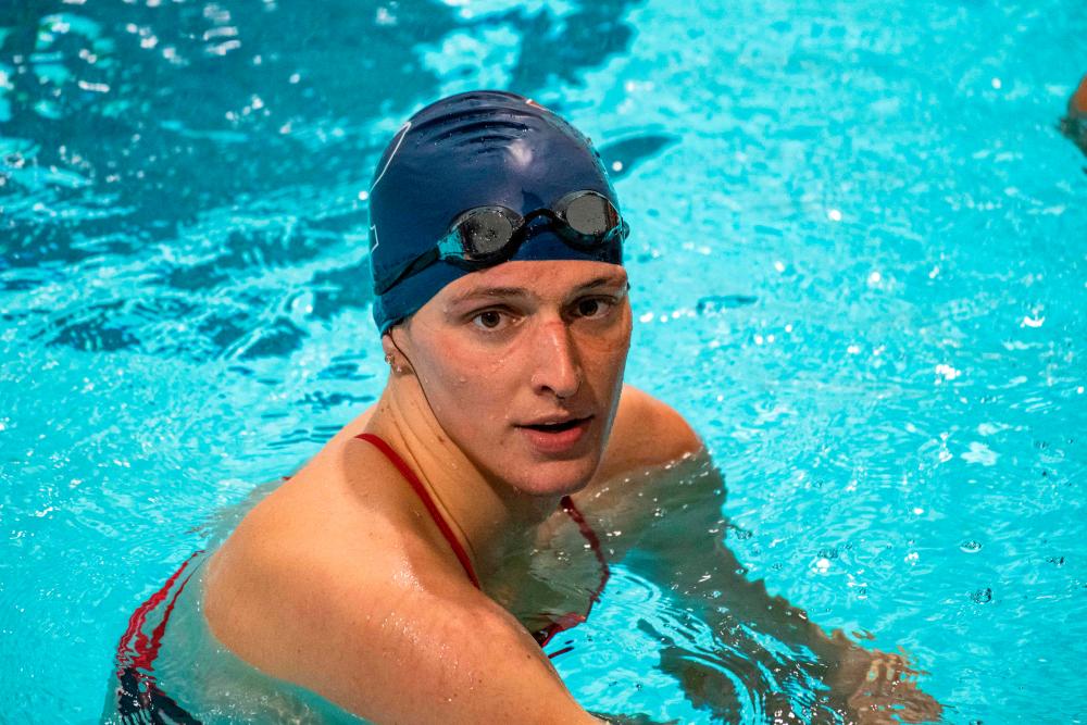 (FILES) In this file photo taken on January 22, 2022 Lia Thomas, a transgender woman, finishes the 200 yard Freestyle for the University of Pennsylvania at an Ivy League swim meet against Harvard University in Cambridge, Massachusetts. AFPPIX