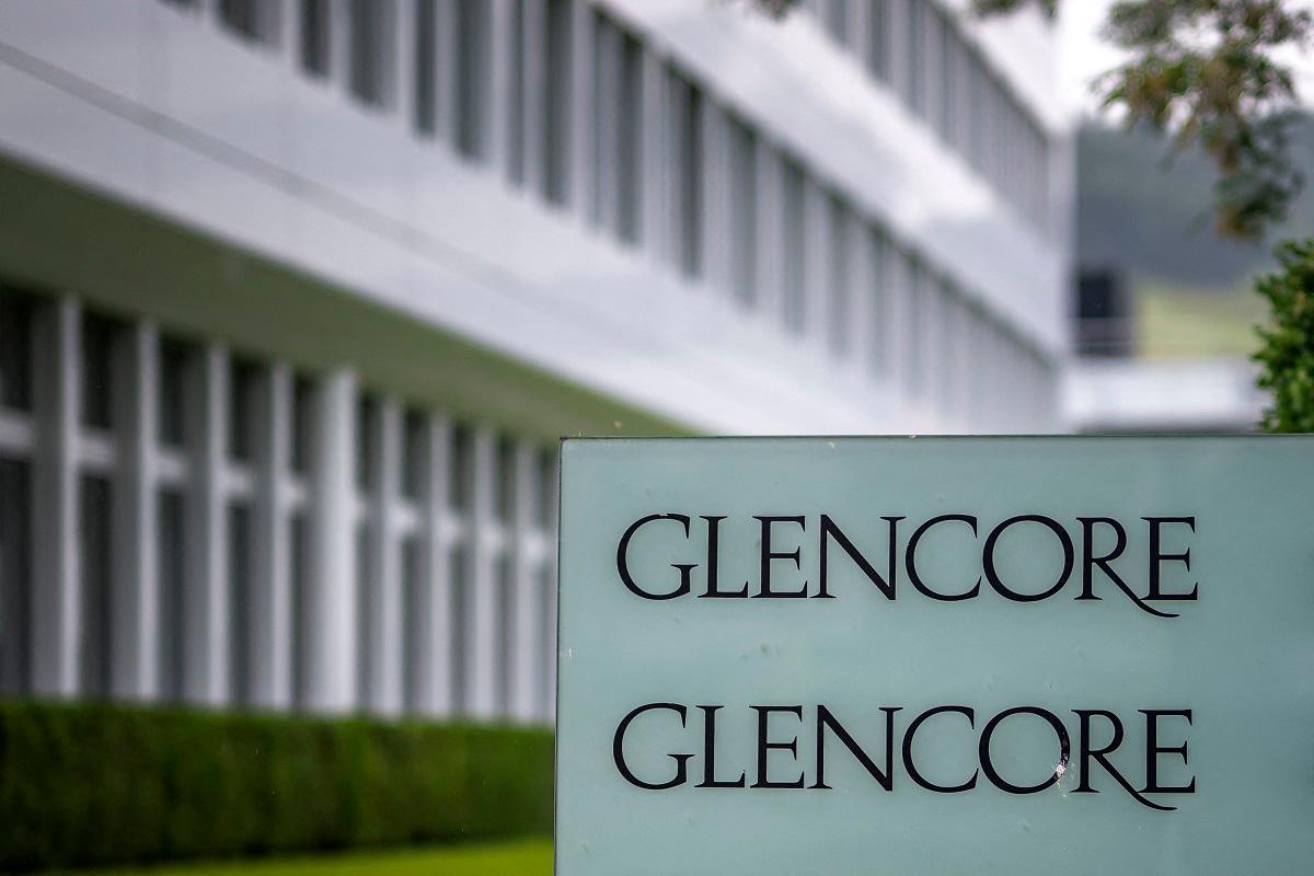 (FILES) A picture taken on May 28, 2025 shows the sign of commodity trading and mining company giant Glencore at their headquarters in Baar, central Switzerland. - Fabrice COFFRINI / AFP