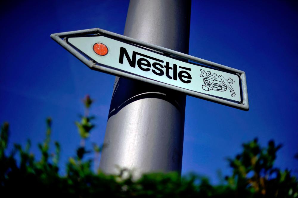 Nestle’s logo on a road sign near the company’s headquarters in Vevey, Switzerland. – AFPpic