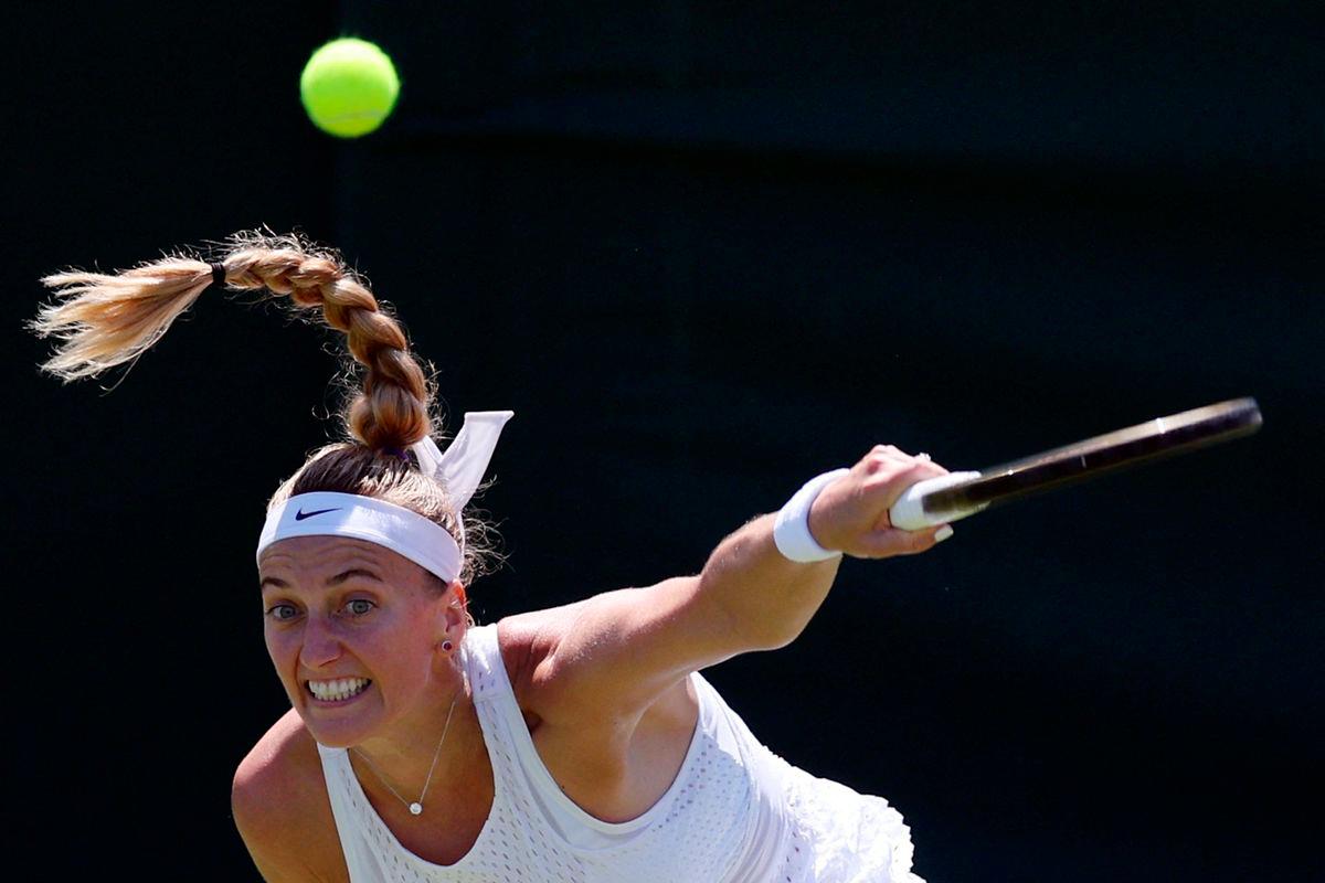 (FILES) Czech Republic’s Petra Kvitova serves to Belarus’ Aliaksandra Sasnovich during their women’s singles tennis match on the fifth day of the 2023 Wimbledon Championships at The All England Tennis Club in Wimbledon, southwest London on July 7, 2023. AFPpix