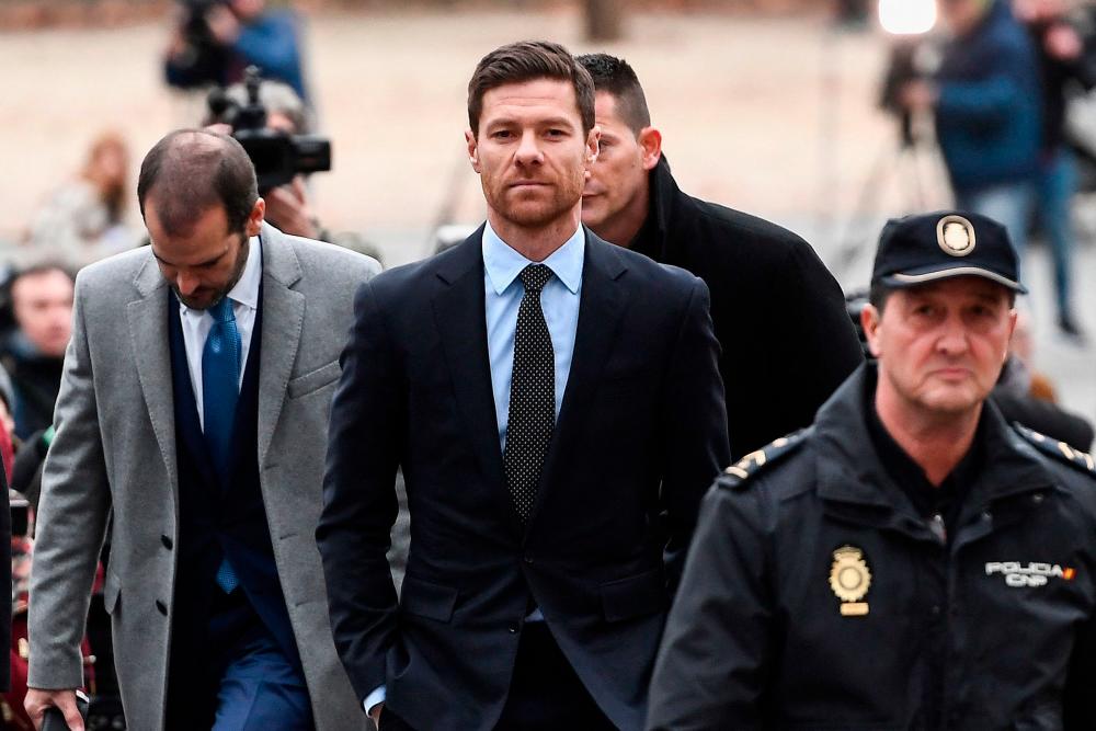 Thai police have warned Liverpool fans not to fall for online scammers impersonating Bayer Leverkusen coach Xabi Alonso, tipped to replace Jurgen Klopp at Anfield in the summer/AFPPix