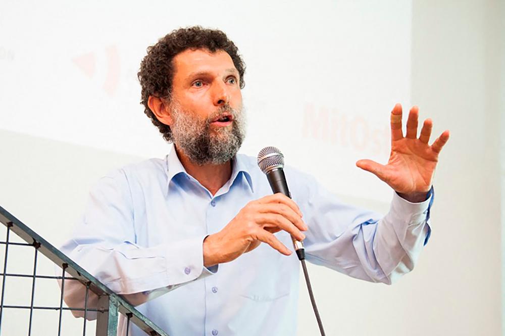 This undated file photo made available on October 15, 2021 and released by the Anadolu Culture Center shows Parisian-born Turkish philanthropist Osman Kavala speaking during an event in Istanbul. AFPpix