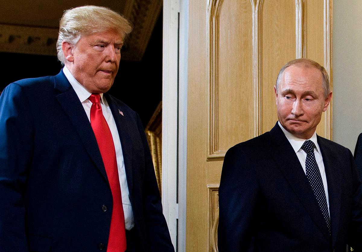 (FILES) US President Donald Trump (L) and Russian President Vladimir Putin arrive for a meeting in Helsinki on July 16, 2018. US President Donald Trump said on August 8, 2025 he would meet with Russian counterpart Vladimir Putin on August 15 in Alaska, as the Republican billionaire hopes to help mediate an end to the war in Ukraine. Photo by Brendan Smialowski / AFP