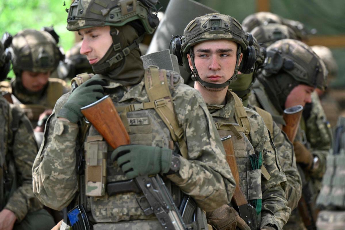 Young members of the 28th Separate Mechanized Brigade, recruited under a new model of voluntary military service ‘Contract 18-24’, take part in a tactical field training exercise at an undisclosed location in the Donetsk Region, on May 1, 2025, amid the Russian invasion of Ukraine. - AFPPIX