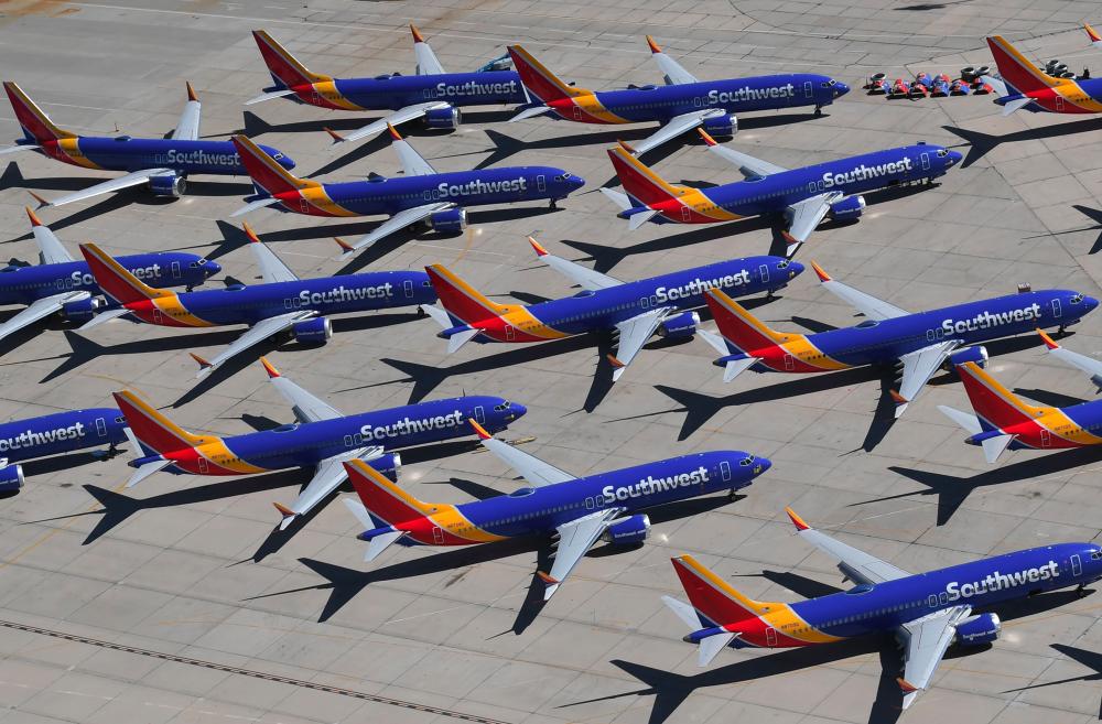 In this file photo taken on March 28, 2019 Southwest Airlines Boeing 737 MAX aircraft are parked on the tarmac after being grounded, at the Southern California Logistics Airport in Victorville, California. - AFP