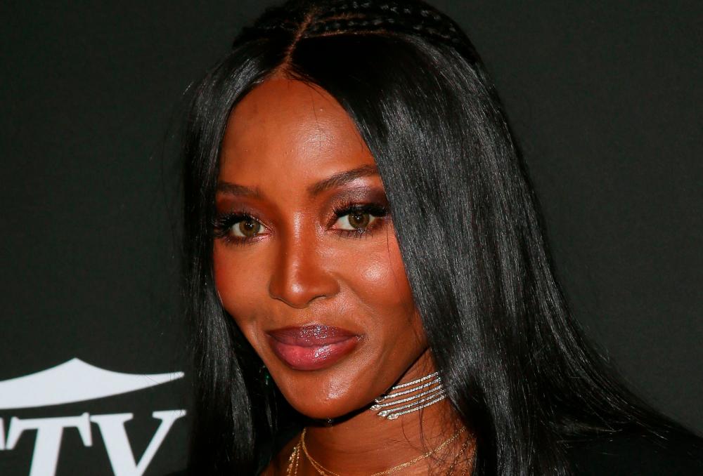 (FILES) In this file photo British model Naomi Campbell arrives for the 10th Anniversary CORE (Community Organized Relief Effort) Gala at the Wiltern theatre in Los Angeles on January 15, 2020. - AFP