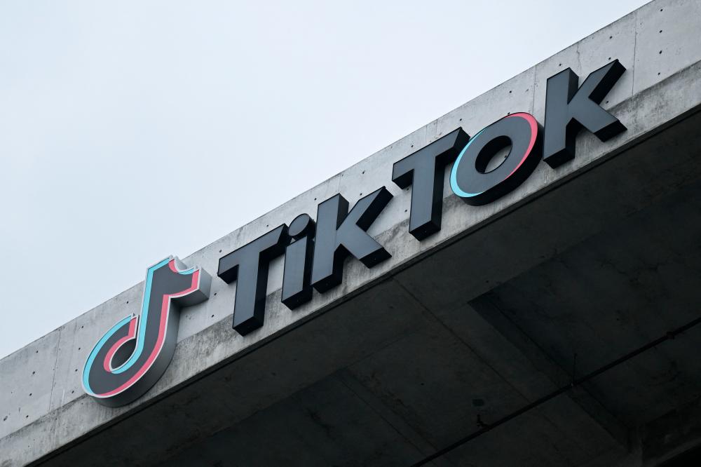 This file photo taken on March 16, 2023 shows the TikTok logo displayed on signage outside TikTok’s social media app company office in Culver City, California/AFPPix