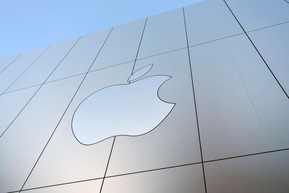 In this file photo taken on Sept 22, 2017 an Apple logo is seen on the outside of an Apple store in San Francisco, California. - AFP
