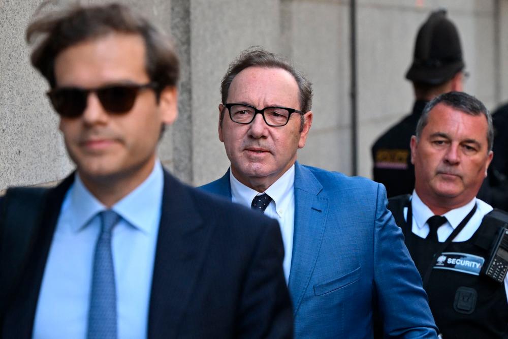 (FILES) In this file photo taken on July 14, 2022 US actor Kevin Spacey arrives to the Old Bailey in London to appear in court over four counts of sexual assault. AFPPIX