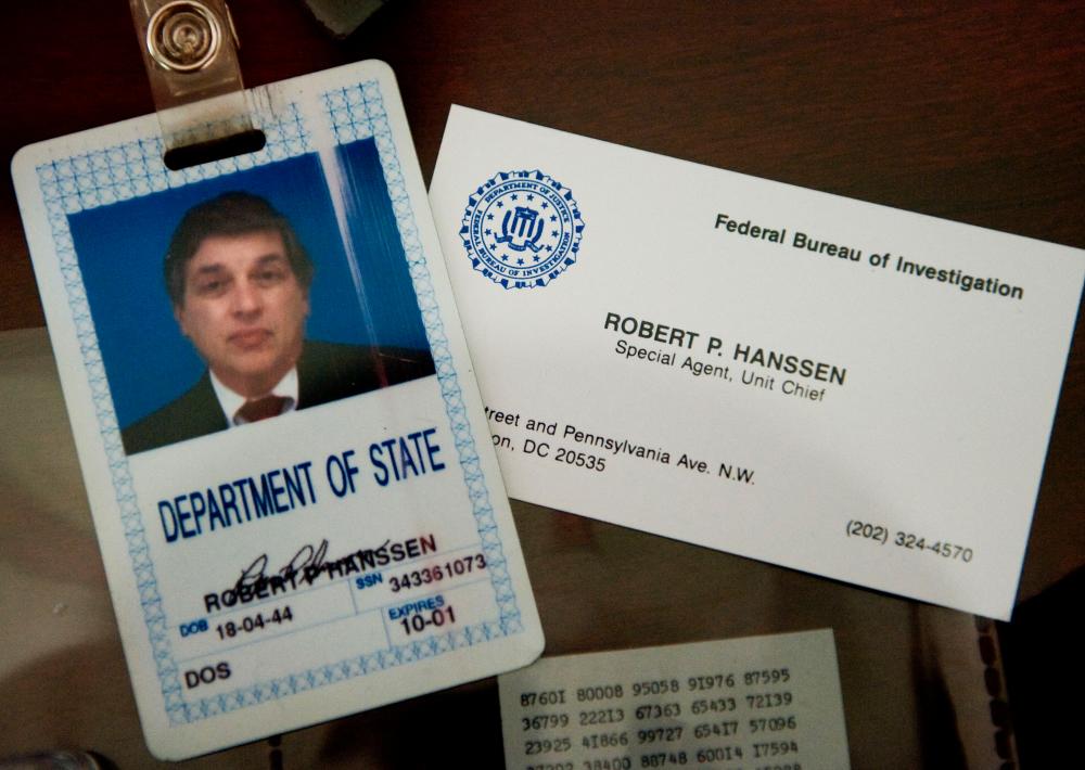 The identification and business card of former FBI agent Robert Hanssen are seen inside a display case at the FBI Academy in Quantico, Virginia, on May 12, 2009/AFPpix