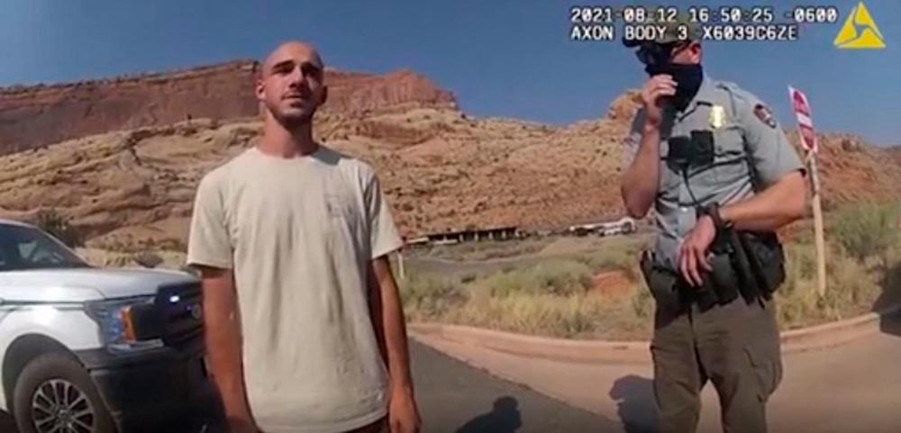 File image from a police bodycam released by the Moab City Police Department in Utah, shows Brian Laundrie (L) speaking with police as they responded to an altercation between Laundrie and his girlfriend Gabrielle Petito/AFPPix