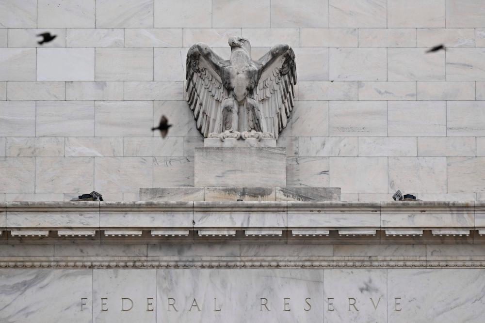 Having raised its key lending rate to between 5.25% and 5.50%, the Fed is now considering cutting rates. – AFPpic