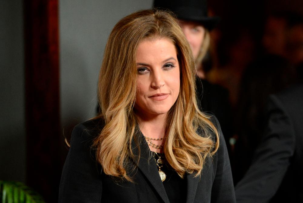 In this file photo taken on May 10, 2012 actress Lisa Marie Presley arrives at the NARM Music Biz Awards dinner party held at the Hyatt Regency Century Plaza in Century City, California/AFPPix