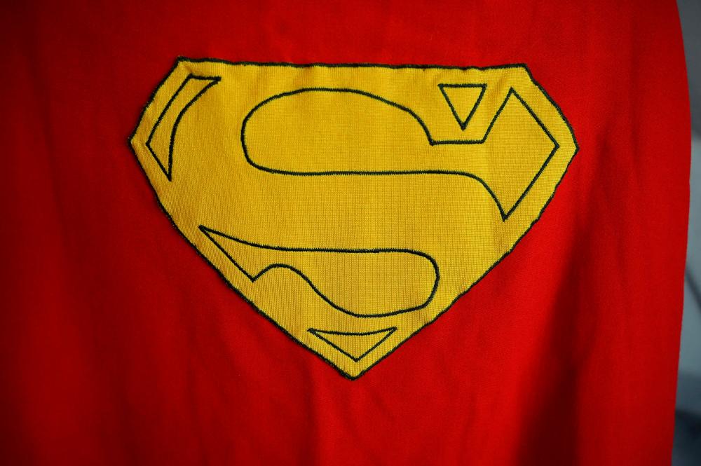 (FILES) In this file photo taken on December 13, 2019 an original Superman cape worn by actor Christopher Reeve in the 1978 “Superman” film. AFPpix