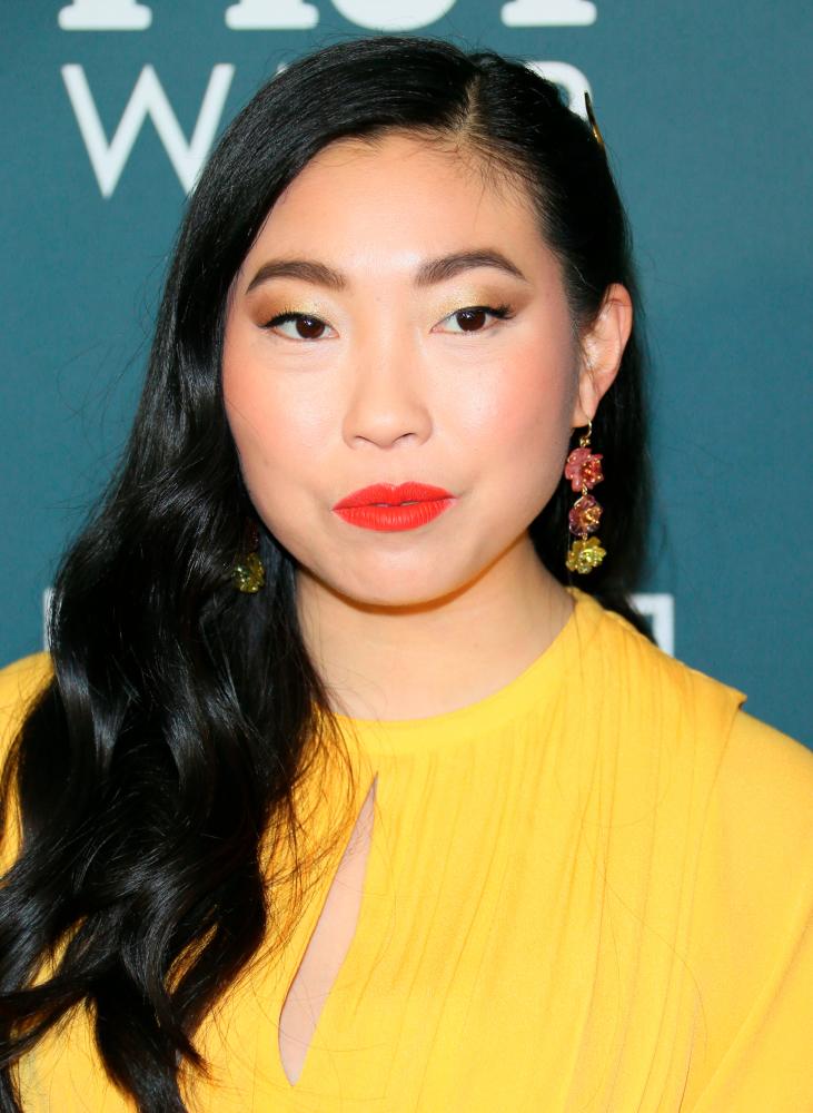 In this file photo taken on January 12, 2020 US actress Awkwafina arrives for the 25th Annual Critics’ Choice Awards at Barker Hangar Santa Monica airport in Santa Monica, California. / AFP / Jean-Baptiste LACROIX