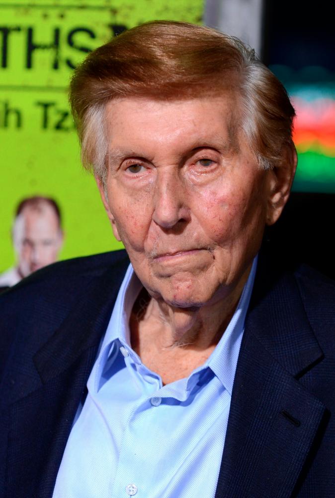 (FILES) In this file photo former Executive Chairman and CEO of Viacom and CBS Corporation Sumner Redstone arrives at the premiere of CBS Films’ ‘Seven Psychopaths’ at Mann Bruin Theatre on October 1, 2012 in Westwood, California. Sumner Redstone, the self-made businessman, philanthropist and World War II veteran who built one of the largest collections of media assets in the world, passed away on August 11, 2020 at the age of 97. / AFP / Joe KLAMAR