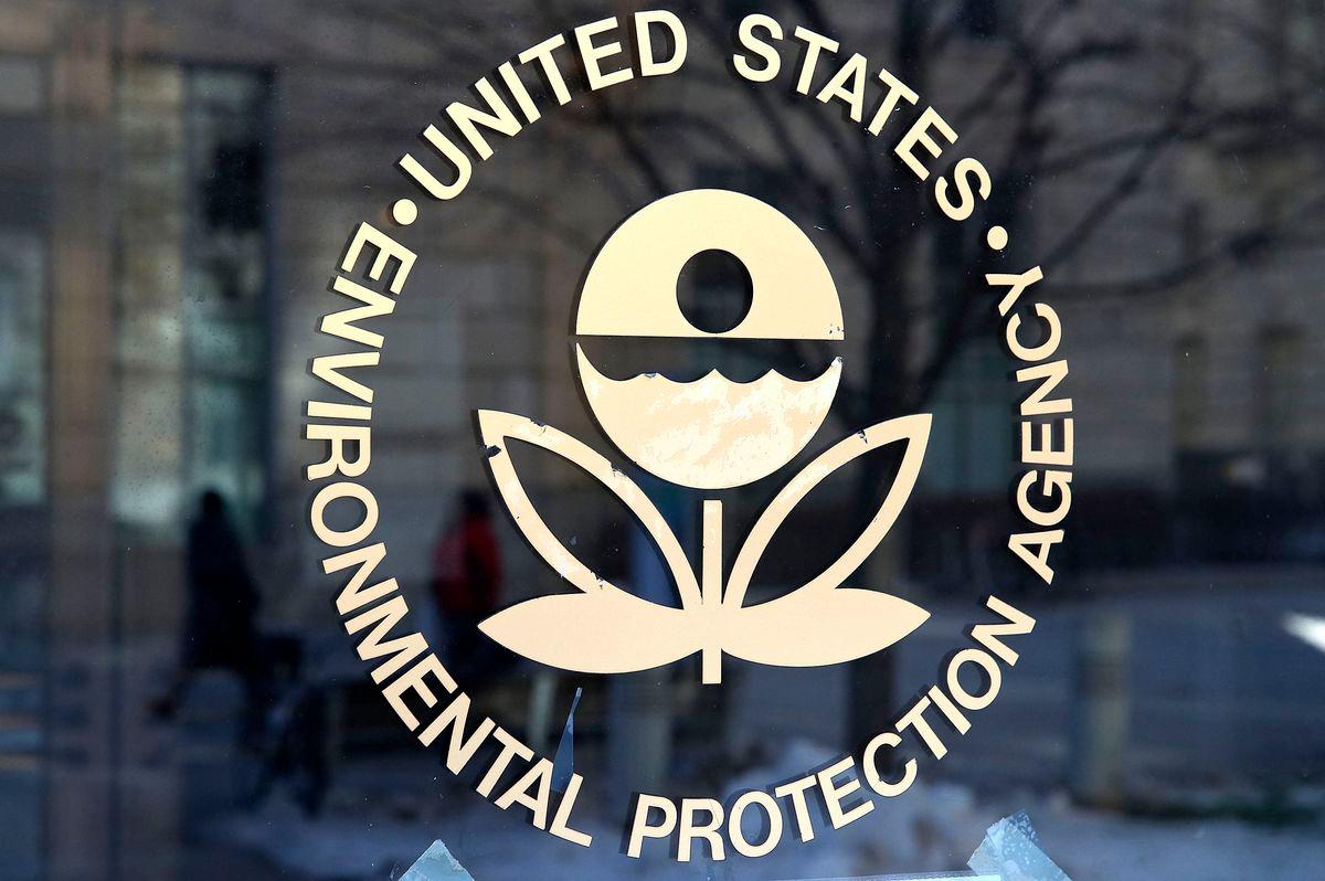 The US Environmental Protection Agency’s (EPA) logo is displayed on a door at its headquarter - Photo by JUSTIN SULLIVAN / GETTY IMAGES NORTH AMERICA / AFP