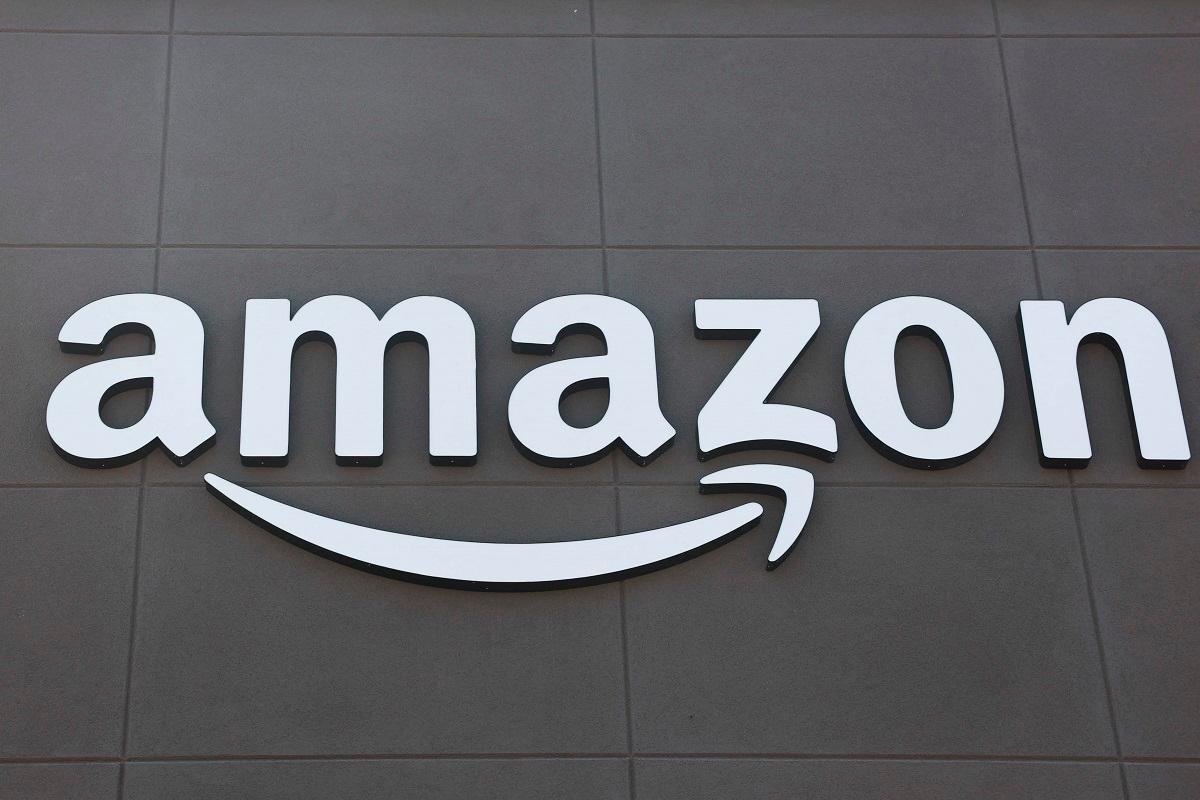 The Amazon logo is displayed outside of an Amazon Fresh grocery store in Torrance, California, on July 29, 2025. - AFP