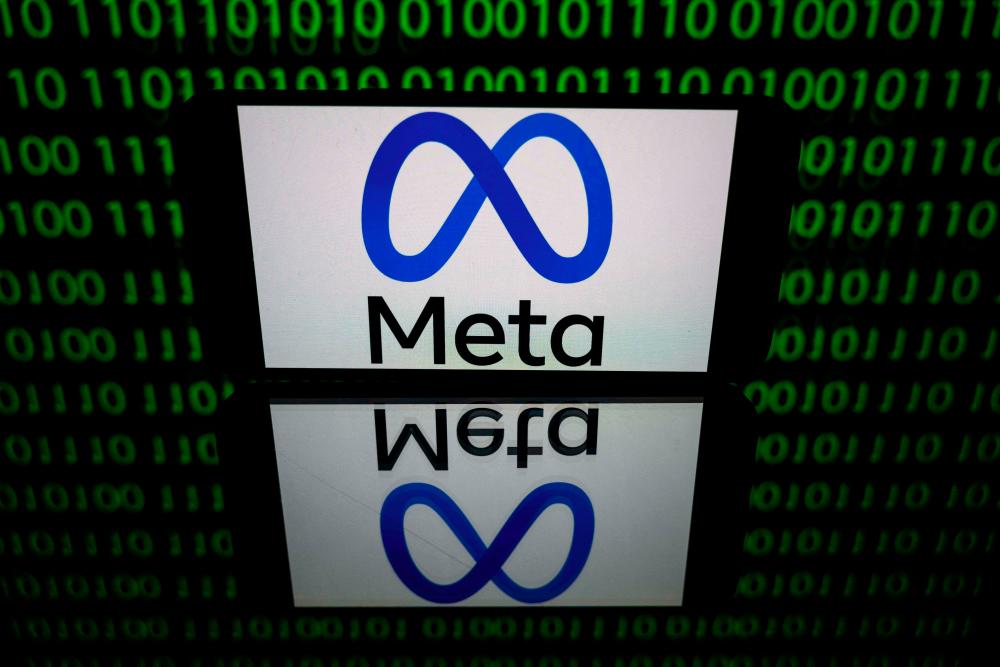 A tablet displaying the logo of Meta. The tech giant’s CEO and founder has called 2023 the ‘year of efficiency’. – AFPpic