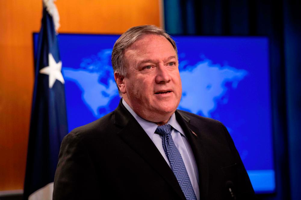 Secretary of State Mike Pompeo presents the 2018 International Religious Freedom Report at the State Department in Washington, DC. — AFP