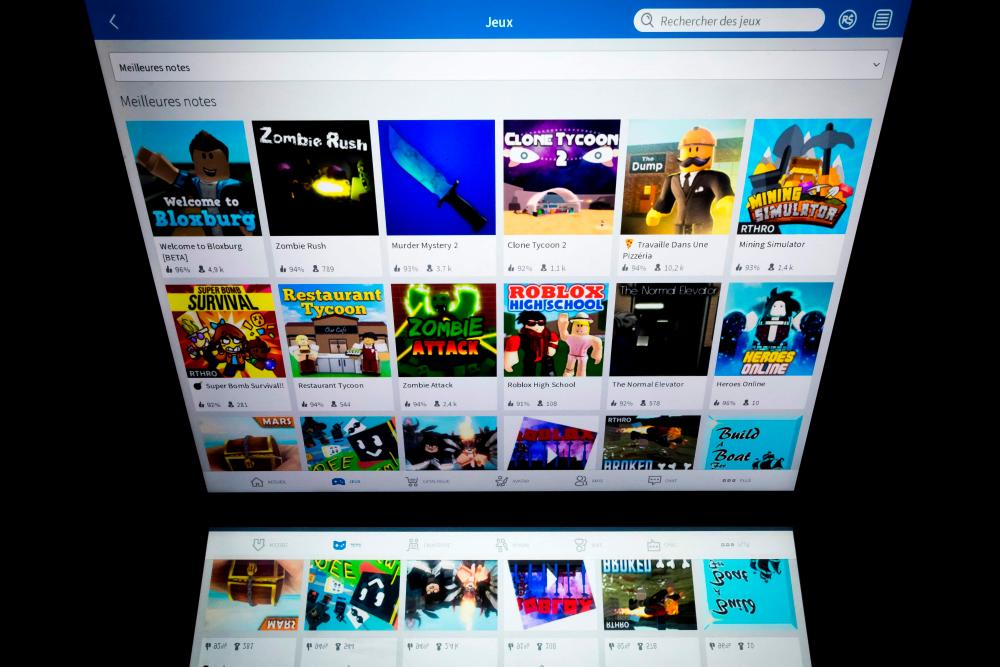(FILES) In this file photo taken on February 01, 2019 this picture shows the online gaming service Roblox displayed on a tablet screen in Paris. US music publishers representing artists such as Ariana Grande, Imagine Dragons and the Rolling Stones said June 10, 2021 they are suing hit video game Roblox for allegedly using songs without permission. – AFP