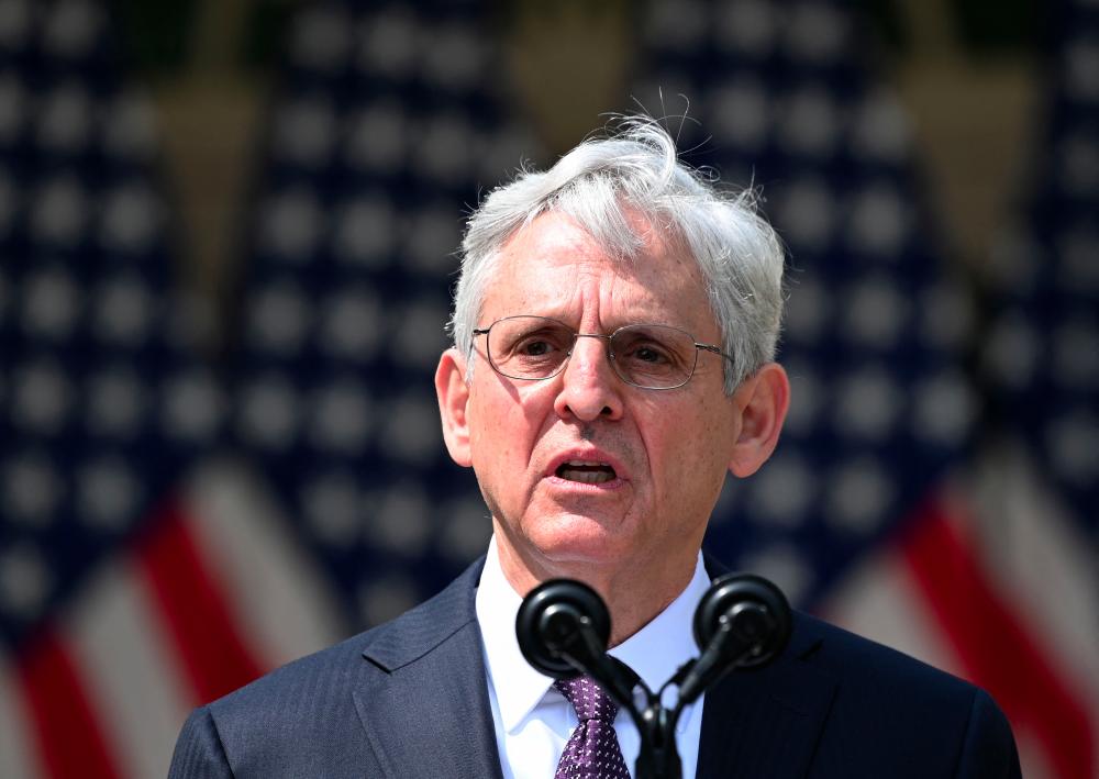 (FILES) In this file photo taken on April 08, 2021, US Attorney General Merrick Garland speaks about gun violence prevention in the Rose Garden of the White House in Washington, DC. - AFPPIX