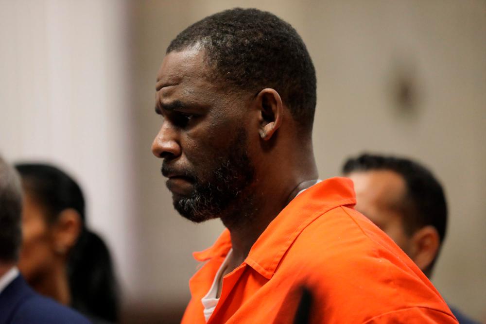 (FILES) In this file photo taken on September 17, 2019 singer R. Kelly appears during a hearing at the Leighton Criminal Courthouse in Chicago, Illinois. AFPPIX