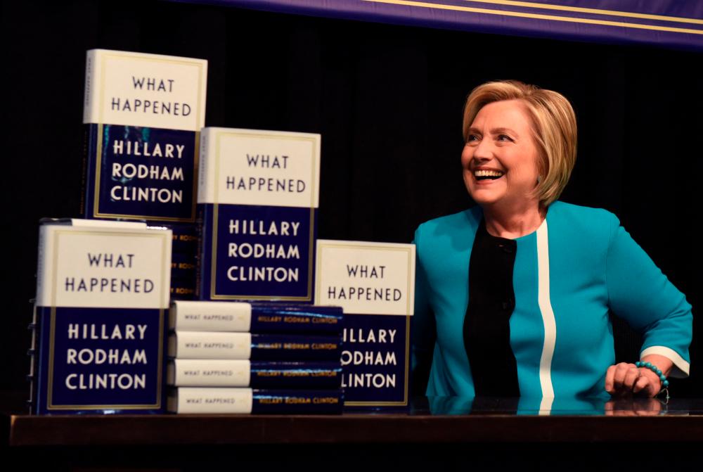 (FILES) In this file photo taken on September 12, 2017 Hillary Clinton kicks off her book tour of her memoire of the 2016 presidential campaign titled “What Happened” with a signing at the Barnes &amp; Noble in Union Square in New York. - AFP