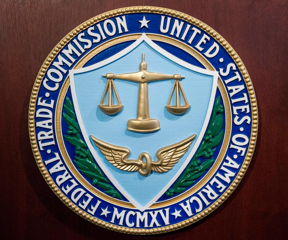 The seal of the Federal Trade Commission is seen at the FTC headquarters in Washington, DC. Amgen expressed disappointment with the FTC suit and said it would work to resolve the litigation in time to close the transaction by mid-December. – AFPpic