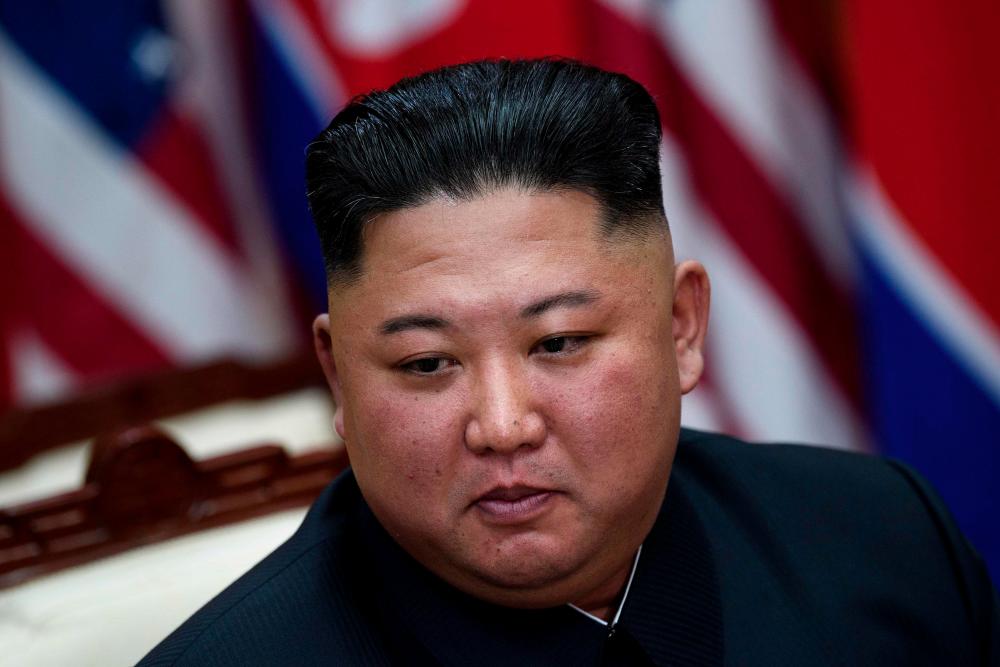 In this file photo taken on June 30, 2019 North Korea’s leader Kim Jong Un before a meeting with US President Donald Trump on the south side of the Military Demarcation Line that divides North and South Korea, in the Joint Security Area (JSA) of Panmunjom in the Demilitarized zone (DMZ). — AFP