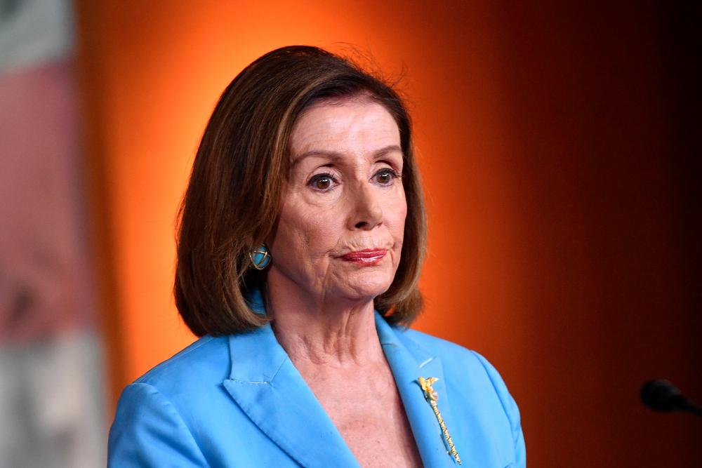 Top Democrat Nancy Pelosi on Oct 8, 2019, accused the White House of an unlawful attempt to hide the facts after it ruled out cooperating with an impeachment probe of President Donald Trump. — AFP