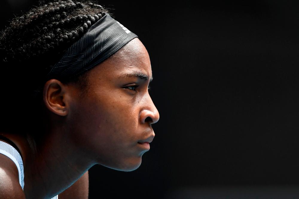 In this file photo Coco Gauff of the US waits to hit a return against Sofia Kenin of the US during their women’s singles match on day seven of the Australian Open tennis tournament in Melbourne on Jan 26, 2020. — AFP