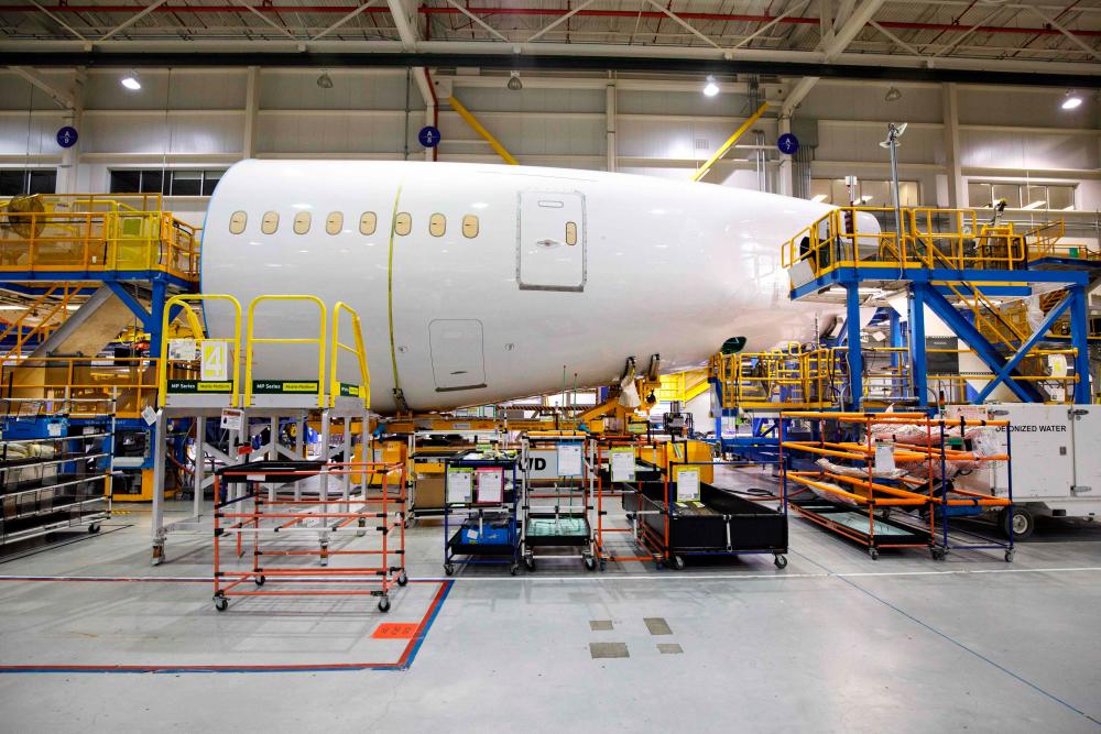 In this file photo taken on December 13, 2022, Boeing 787 Dreamliners are under production at the Boeing manufacturing facility in North Charleston, South Carolina. Riyadh Air and Saudia reached agreements to purchase 78 Boeing 787 Dreamliner planes to support Saudi Arabia’s expanding aviation plans, Boeing announced March 14, 2023. (Photo by Logan Cyrus / AFP)