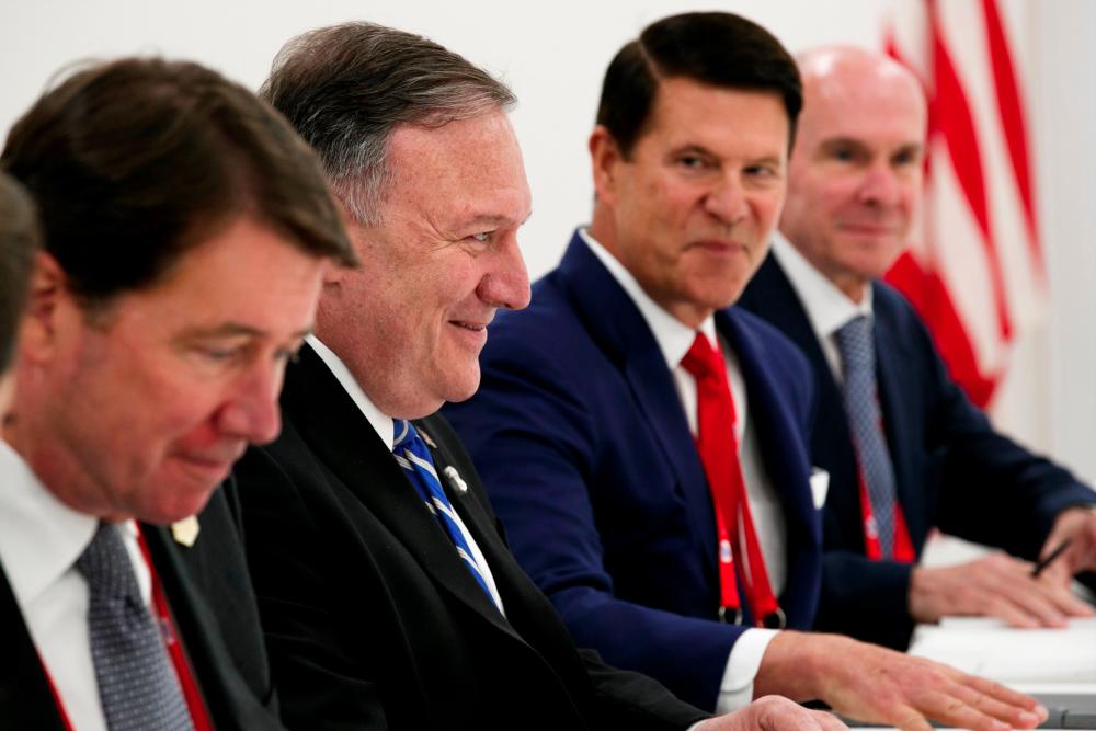 U.S Ambassador to Japan William Hagerty (Left), U.S Secretary of State Mike Pompeo (Center) Under Secretary of State for Economic Growth, Energy, and the Environment Keith Krach (2nd from right), and Senior Adviser Michael McKinley (Right) attend a meeting with Japanese Foreign Minister Taro Kono during the G20 summit in Osaka on June 28, 2019. — AFP