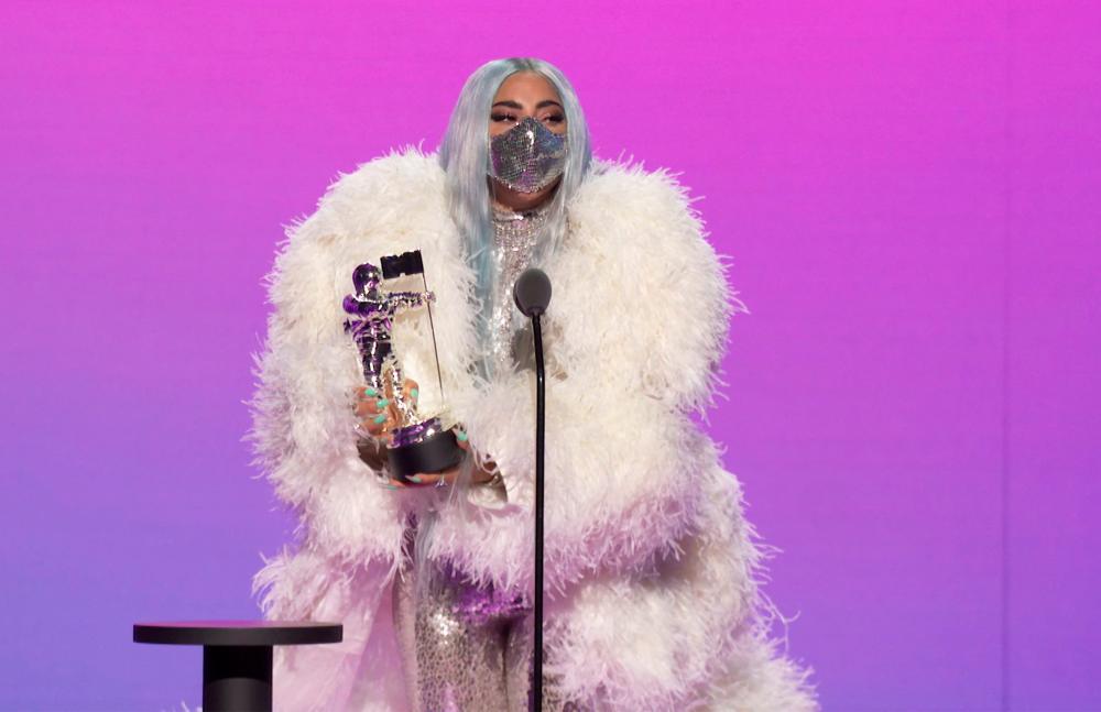 (FILES) In this file photo taken on August 30, 2020 this handout image released courtesy of MTV shows US singer-songwriter Lady Gaga accepting the award for Artist of the Year during the 2020 MTV Video Music Awards, being held virtually amid the coronavirus pandemic, broadcast in New York. AFP PHOTO / MTV