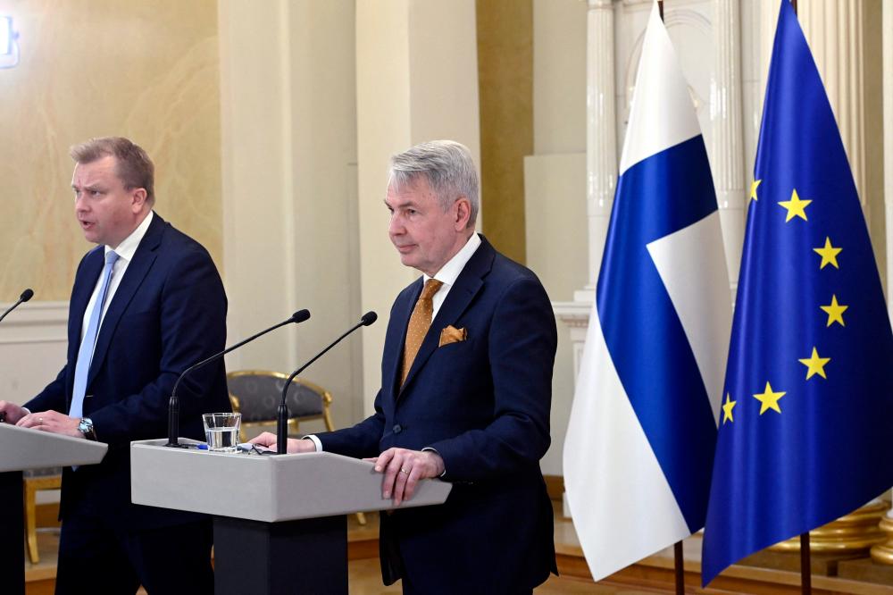 Finland’s Minister of Defence Antti Kaikkonen (L) and Finland’s Foreign Minister Pekka Haavisto give a press conference to announce that Finland will apply for NATO membership, at the Presidential Palace in Helsinki, Finland on May 15, 2022. AFPPIX