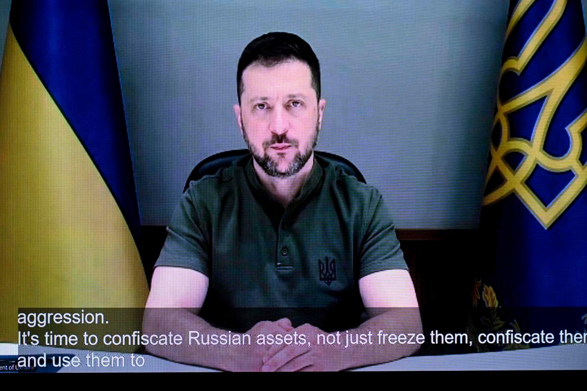 Ukraine’s President Volodymyr Zelensky adresses the audience via a video call during the opening of the Helsinki +50 Conference, marking the 50th anniversary of the Helsinki Final Act in Helsinki, Finland, on July 31, 2025. (Photo by Mikko Stig / LEHTIKUVA / AFP)