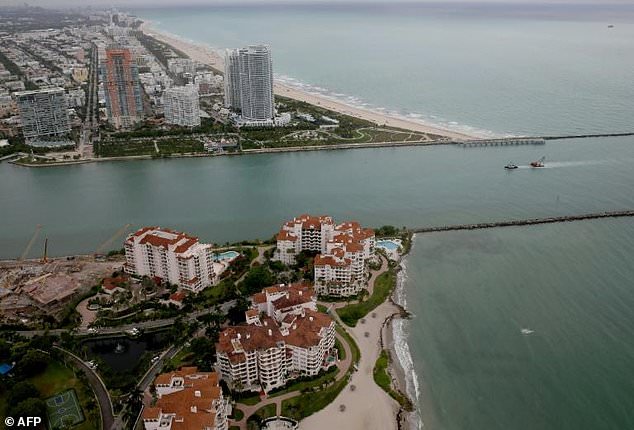 Fisher Island (bottom) in Miami was the home of convicted swindler Anthony Gignac who duped investors by posing as Saudi Prince Khalid Bin Al-Saud. — AFP