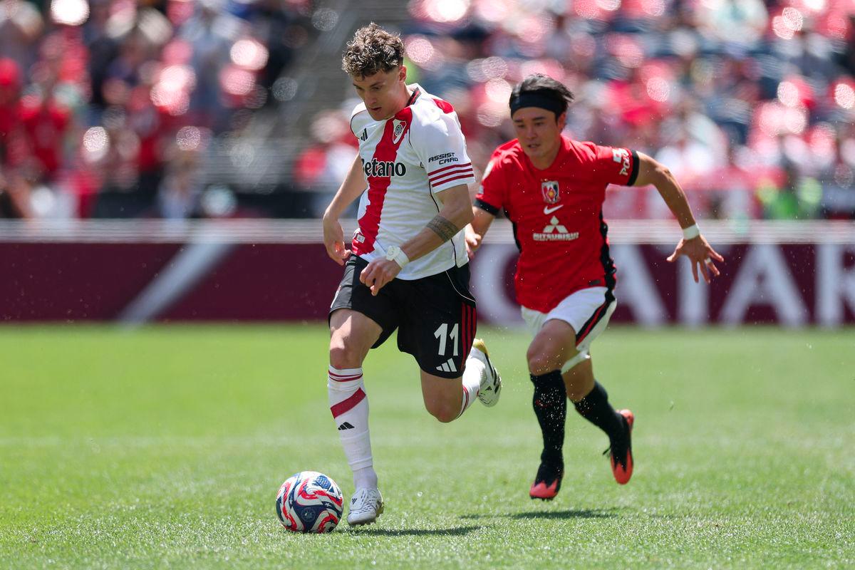 Facundo Colidio #11 of CA River Plate is challenged by Hirokazu Ishihara #4 of Urawa Red Diamonds during the FIFA Club World Cup 2025 group E match between CA River Plate and Urawa Red Diamonds at Lumen Field on June 17, 2025 in Seattle, Washington. - AFPPIX