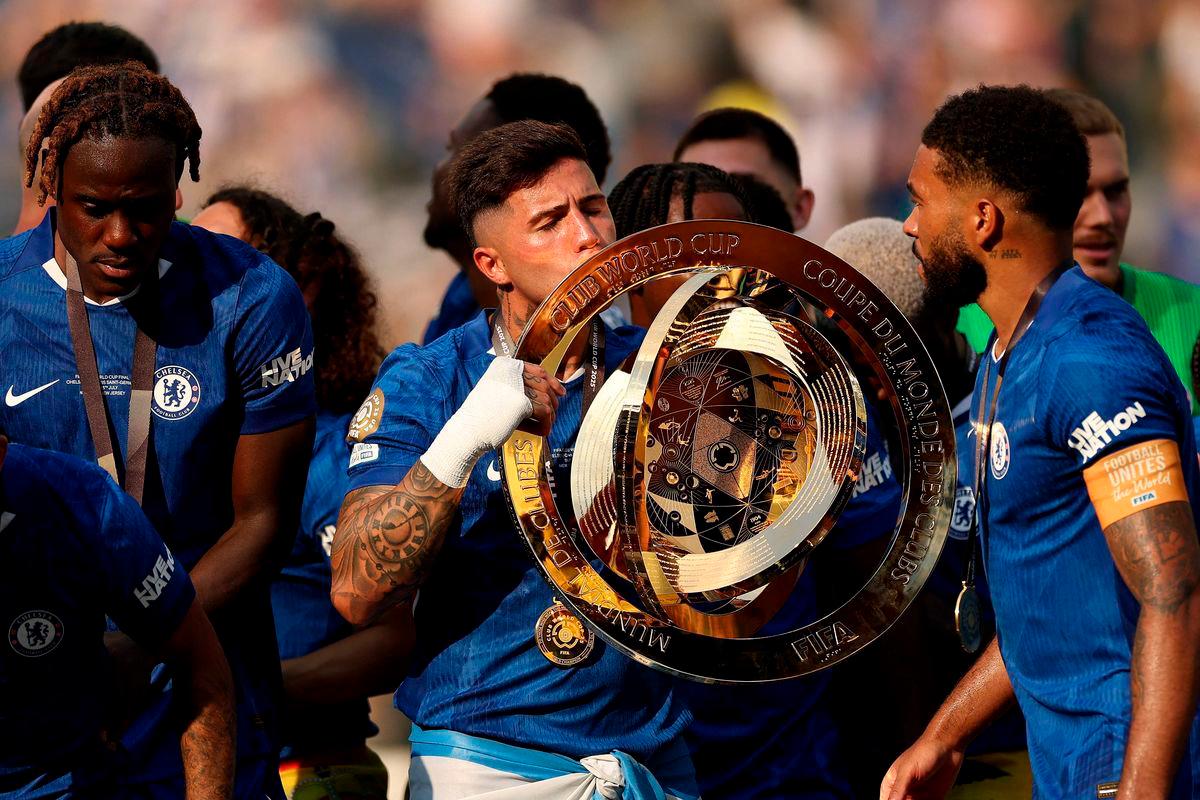 Enzo Fernandez #8 of Chelsea FC lifts the FIFA Club World Cup trophy after his team’s victory following the FIFA Club World Cup 2025 Final match between Chelsea FC and Paris Saint-Germain at MetLife Stadium on July 13, 2025 in East Rutherford, New Jersey. Photo by Buda Mendes / GETTY IMAGES NORTH AMERICA / AFP