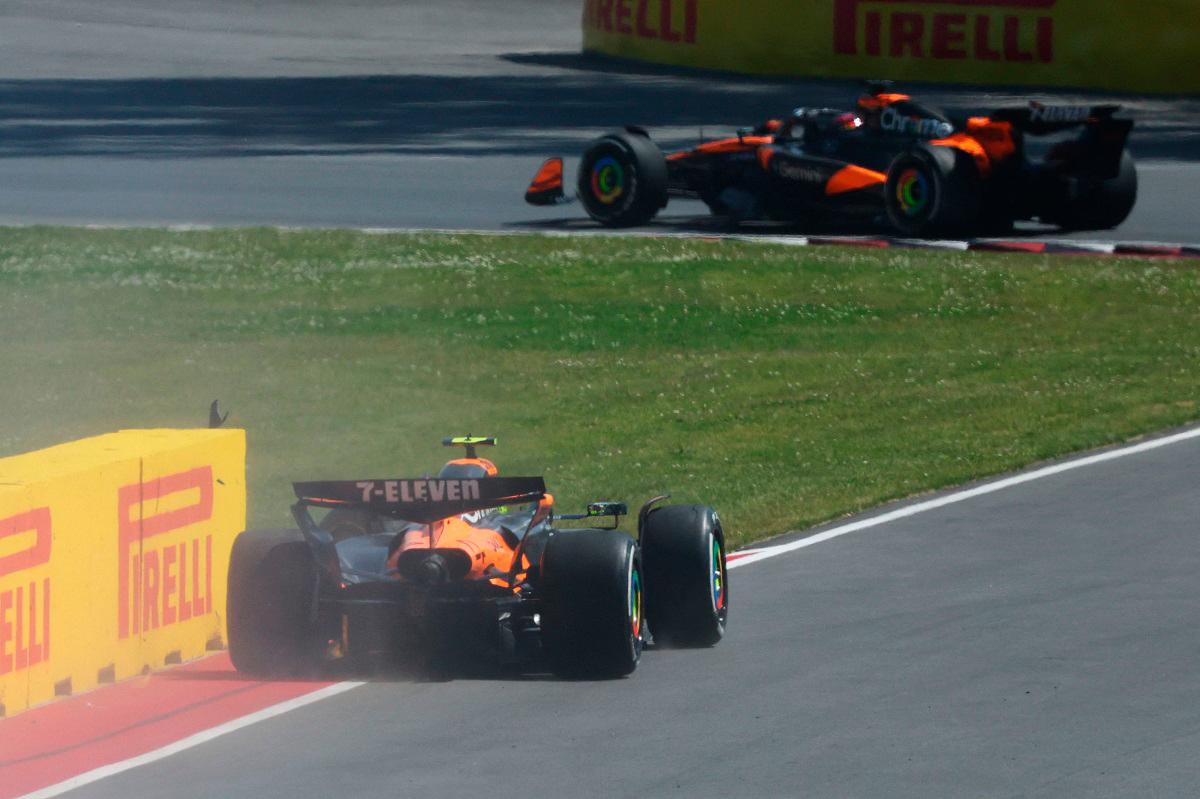 Oscar Piastri of Australia driving the (81) McLaren MCL39 Mercedes leads after Lando Norris of Great Britain driving the (4) McLaren MCL39 Mercedes hits the wall during the F1 Grand Prix of Canada at Circuit Gilles-Villeneuve on June 15, 2025 in Montreal, Quebec. - Clive Rose/Getty Images/AFP