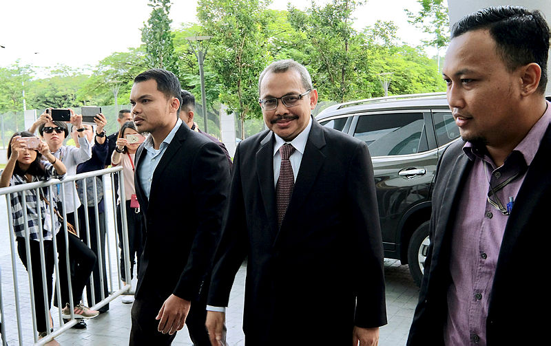Former Malaysian Anti-Corruption Commission (MACC) chief commissioner Tan Sri Dzulkifli Ahmad (C), at its headquarters in Putrajaya, this morning. — Bernama