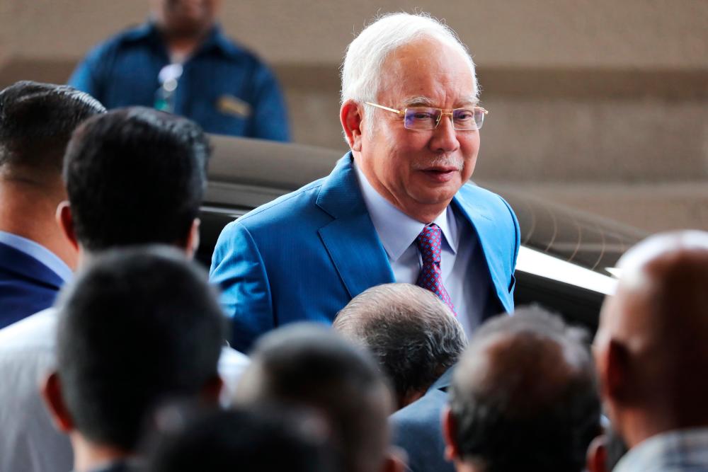 Former prime minister Datuk Seri Najib Abdul Razak arrives at the Kuala Lumpur High Court today. - Reuters