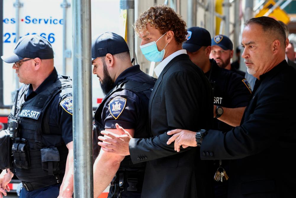 Former U.S. Marine Daniel Penny leaves Manhattan Criminal Court, after his arraignment for the death of Jordan Neely, a man whose death has been ruled a homicide by the city's medical examiner after being placed in a chokehold on a subway train, in New York City, U.S., May 12, 2023/REUTERSPix