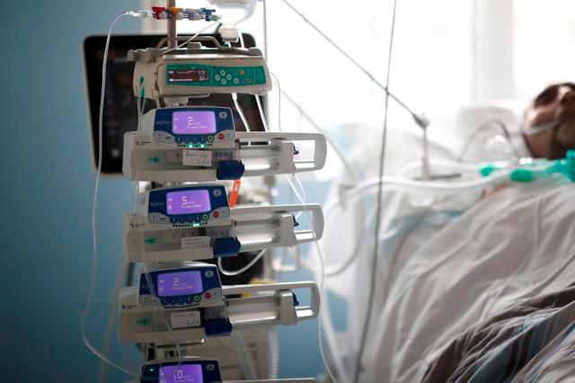 A patient suffering from the coronavirus disease (Covid-19) is seen in the Intensive Care Unit (ICU) at the Clinique de l’Estree - ELSAN private hospital in Stains, near Paris, France, March 18, 2021. — Reuters