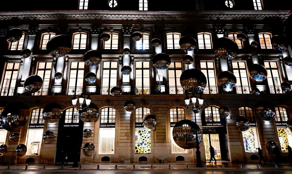 A display of convex mirrors adorning the exterior of the Louis Vuitton flagship building off Place Vendome in Paris on Thursday, Jan 26 2023. – AFPpic