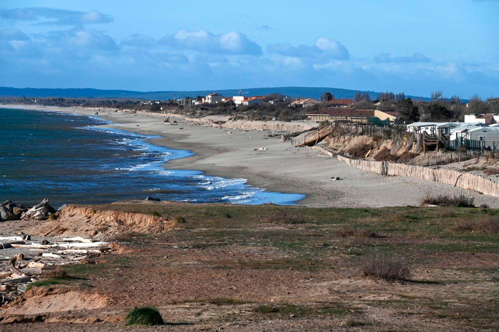 A picture taken on January 15, 2021 shows a view of a camp site on a beach that shrunk because of the coastal erosion, in Vias, near Montpellier, southern France. –AFP