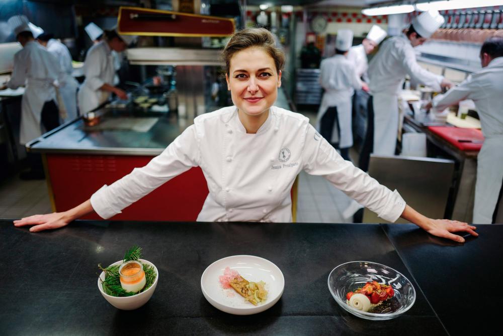 French pastry chief Jessica Prealpato of the Plaza Athenee hotel poses in her restaurant’s kitchen for a portrait in Paris on June 6, 2019. Prealpato was named as the 2019 Best Restaurant Pastry Chef by the World’s 50 Best Restaurants on June 9, 2019./ AFP / LUCAS BARIOULET